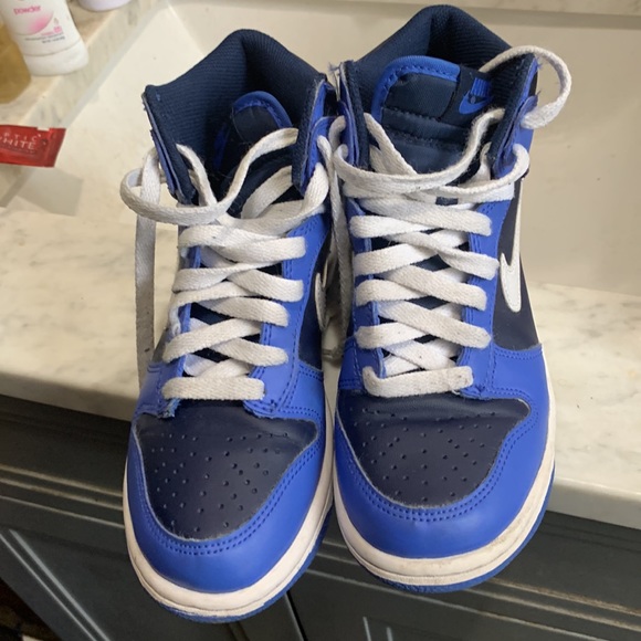 Blue and white kid nikes